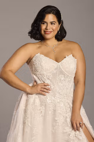 View Galina Signature Strapless Beaded Lace Basque Waist Wedding Dress in all available color and sizes Picture of Strapless Beaded Lace Basque Waist Wedding Dress